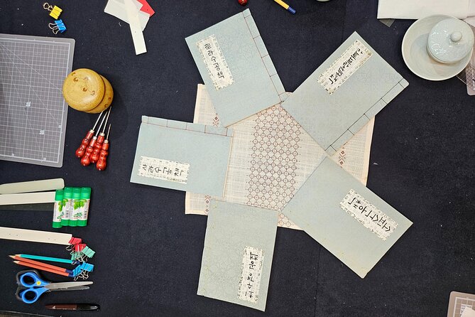 Create a Handmade Traditional Korean Notebook in Insadong - Traditional Korean binding: holes, needle, and thread