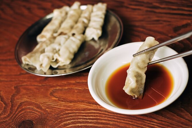 Private Downtown Seoul Food & Market Tour with 8+ Tastings - Namdaemun Market: oldest and largest, with a food-first vibe