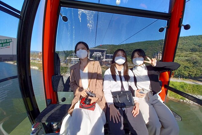 Samaksan Cable Car and Nami Island Day Escape with Railbike - Nami Island on foot: tree-lined paths, waterfalls, and statues