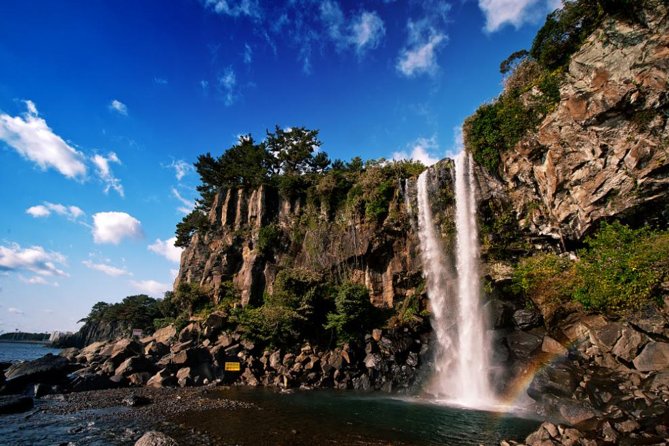 Small Group 7D Korea package Tour with Seoul Gyeongju Busan Jeju - Jeju Day 1: beaches, sunrise peak, and volcanic oddities
